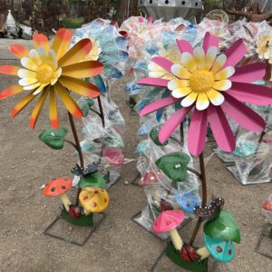 4ft flower spinner with mushrooms on bottom on stand (color may vary)